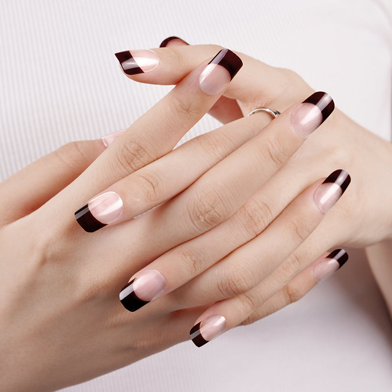 Modern electric violet French tip nails on hands, created with a DIY semi-cured gel sticker kit for a bold, long-lasting manicure.