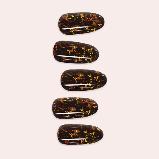 Gold Fleck DIY Gel Nail Sticker Kit with shimmering metallic flakes on a clear or nude semi-cured base for an easy, luxurious manicure.